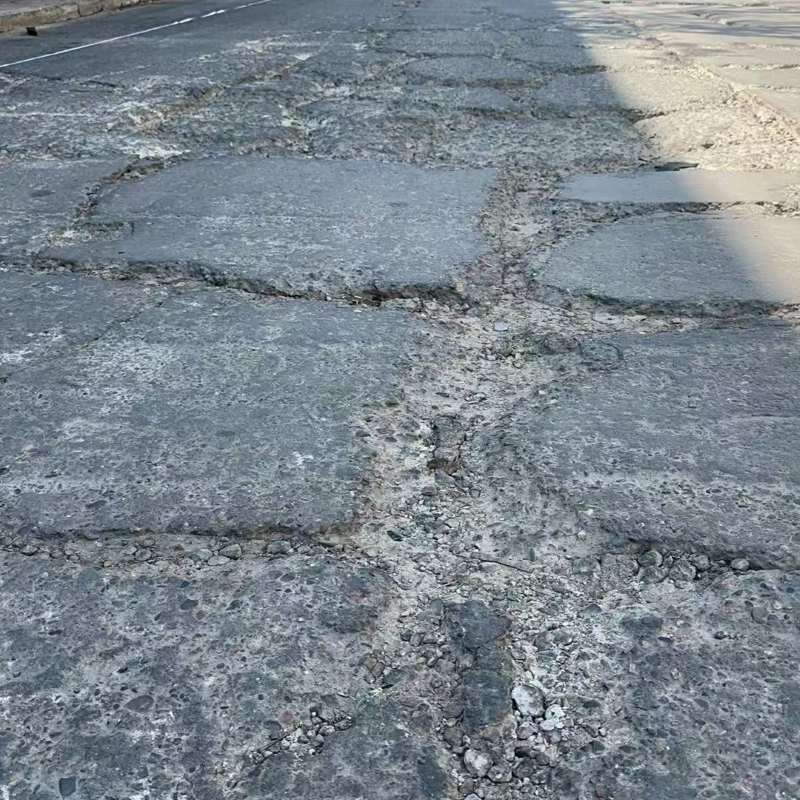 邙山路面起砂露石子修补料